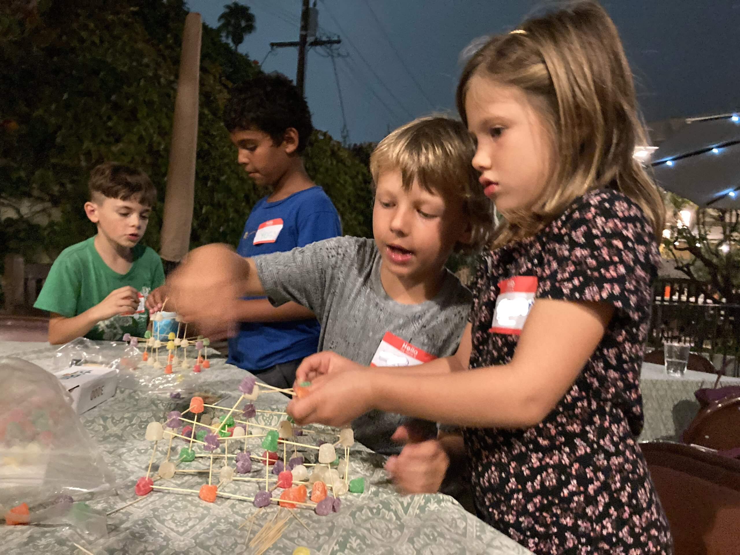 Kids build gumdrop sculptures at First Friday Fun night