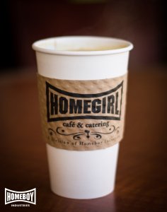 paper coffee cup with image of Homegirl cafe & catering