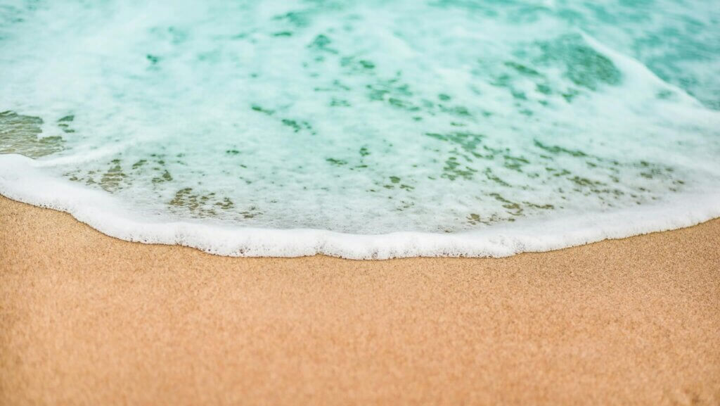 Refreshing beach sand and water