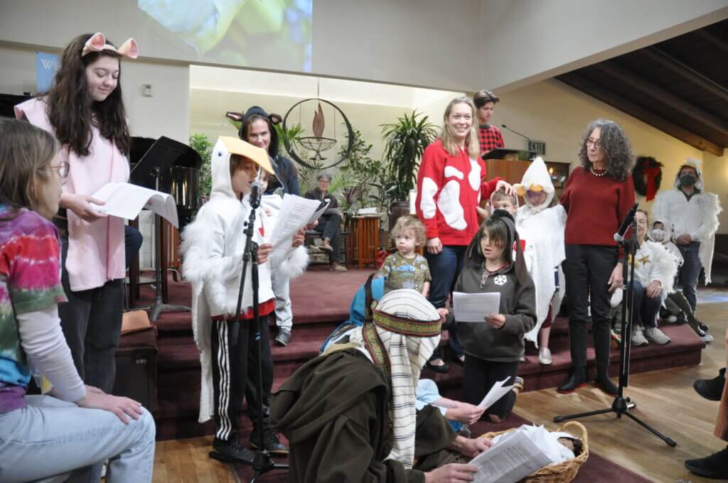 Friendly Beasts (kids in costume) on the chancel