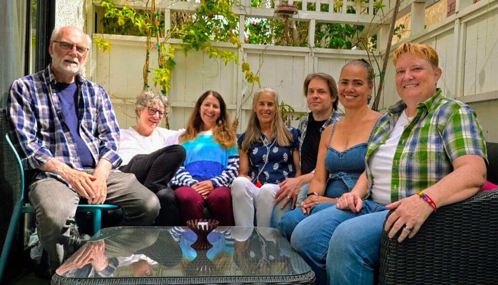 UUSM Ministerial Search Committee - 7 people seated and facing the camera