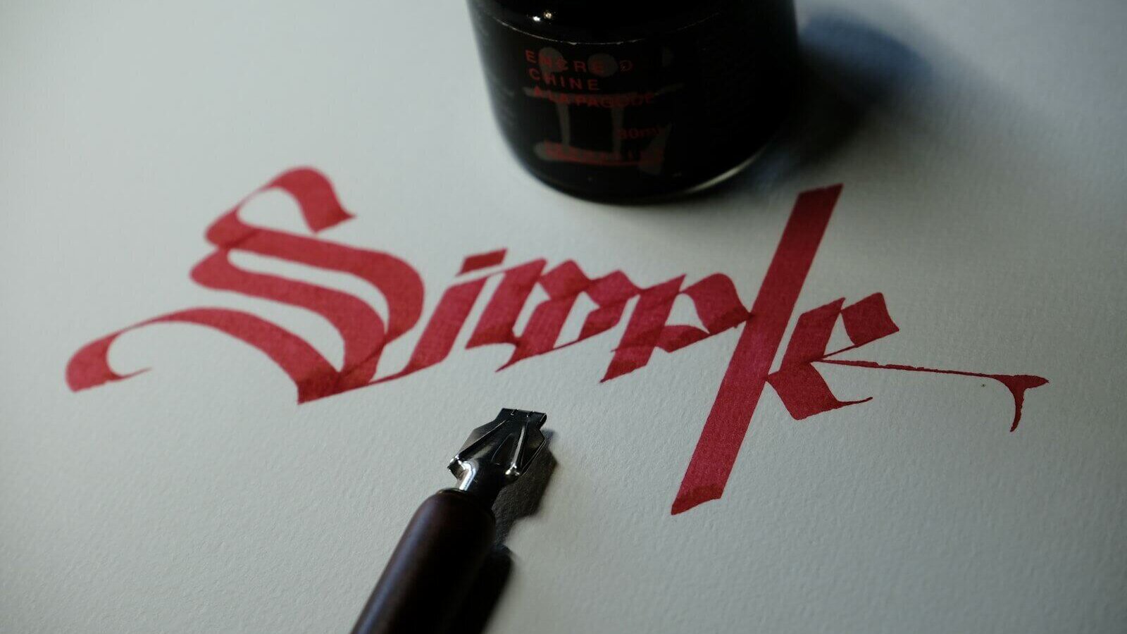 black and silver steel bottle opener