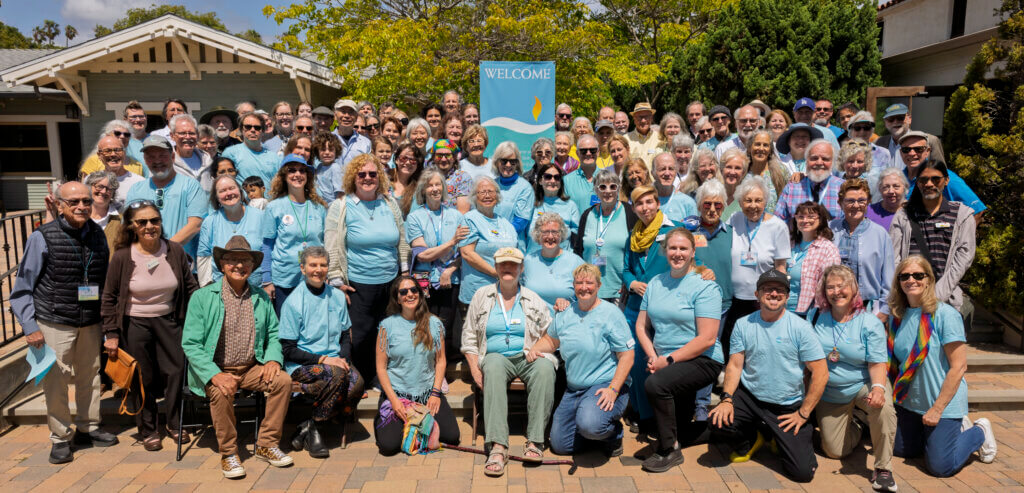 Group photo of congregation wearing UUSM colors.